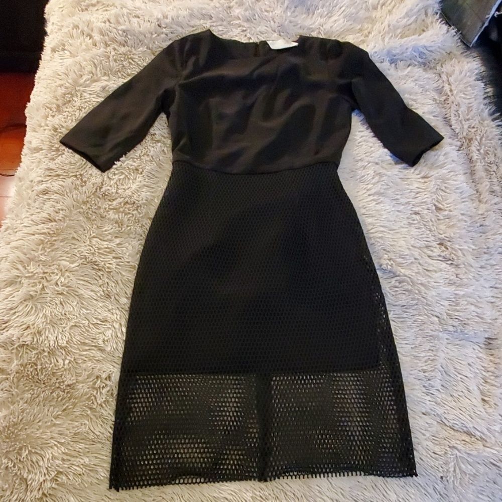 Beautiful black midi J.O.A. dress with net skirt